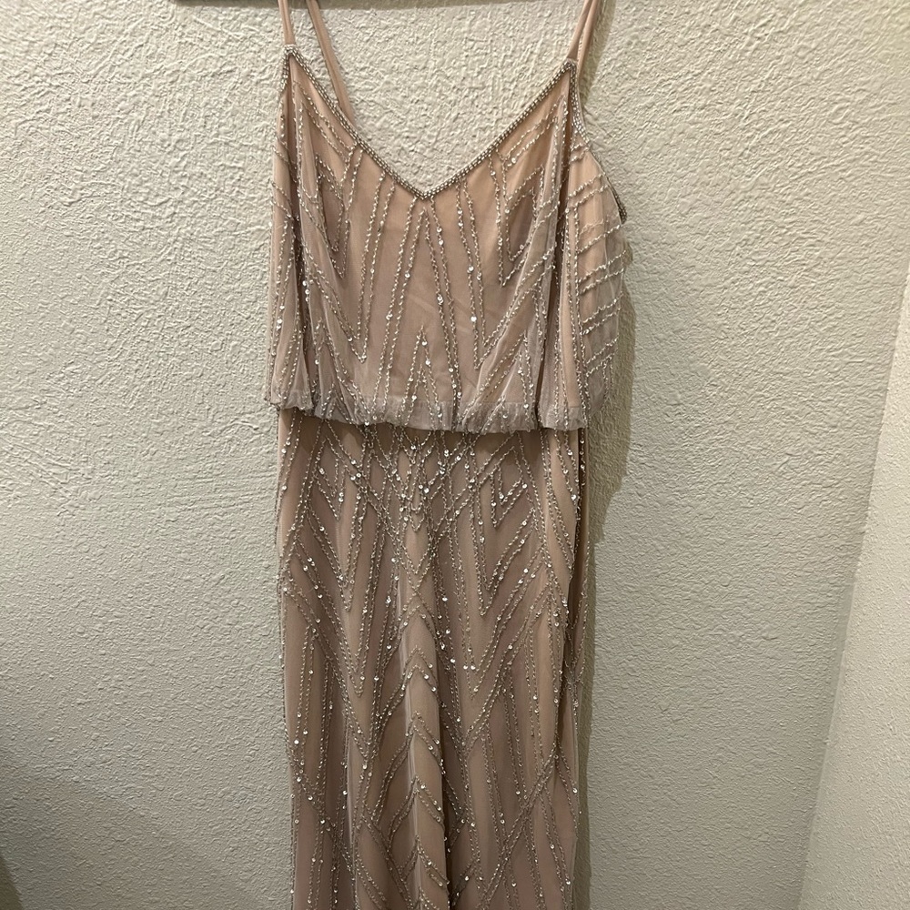 Long gold bridesmaid dress. Worn once. Bottom is semi dirty. need dry cleaning.